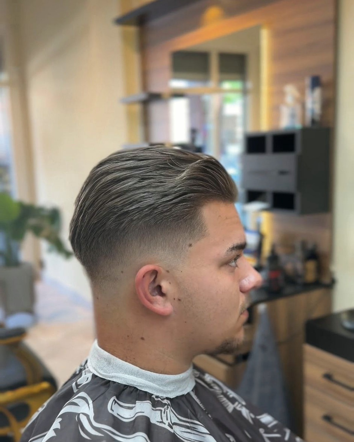 Strakke fade met verzorgde styling bij RochBarber